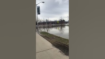 Record floodwaters fill streets outside MSU Spartan Stadium
