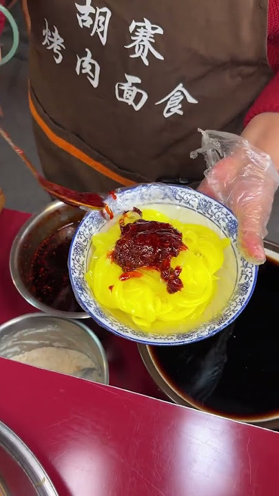 西宁的黄色刮凉粉你想尝尝嘛。#路边摊美味