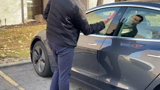 Man implants Tesla key into skin, unlocks car by raising hand