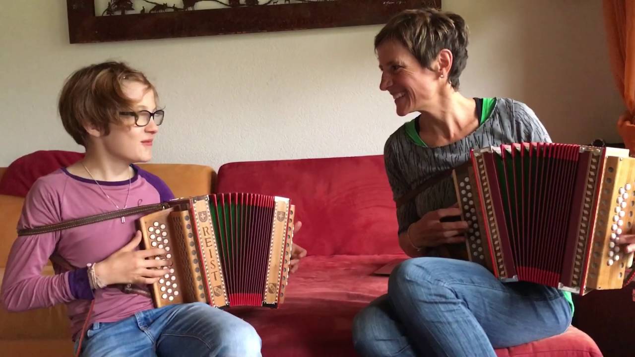 Mom and Daughter play Swiss accordion