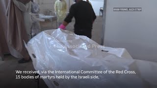 Mother hopes to find remains of missing son as Israel returns remains of another 15 Palestinians