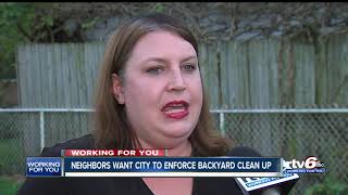 Neighbors want city to enforce backyard cleanup