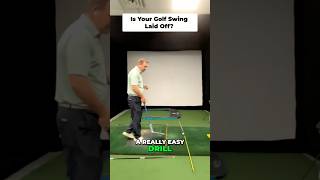Master your golf swing plane! This drill uses a training aid and laser to perfect your backswing,