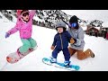 NiKO LEARNS TO SHRED!! Family Snow Day routine boarding with the Kids and Adley does her first jump!