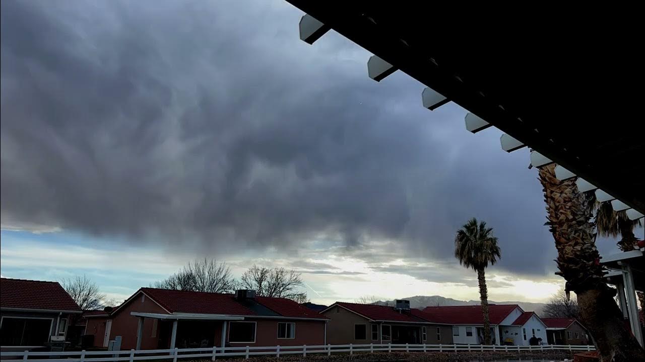 Time lapse of thunderstorms with showers, virga, and small mammatus