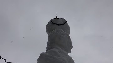 Flying Drone During Heavy Snowfall - Big Snowman - Protocol Dronium Zero