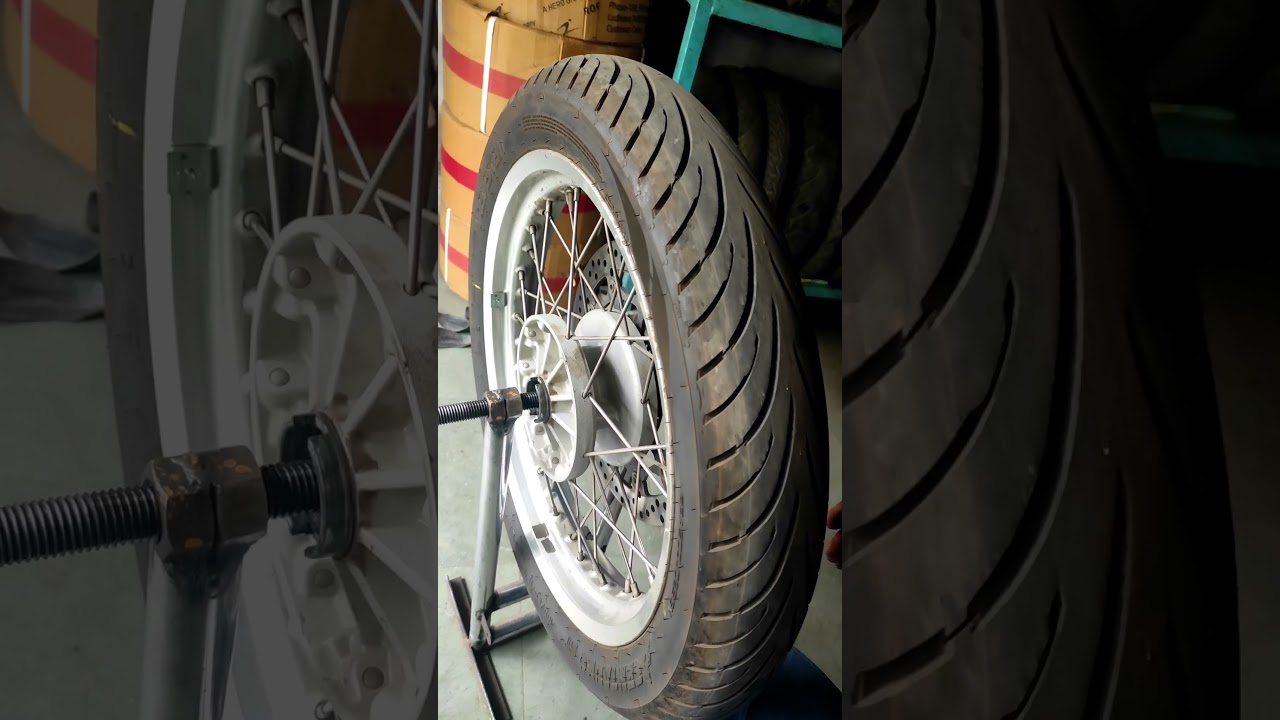 Balancing motorcycle wheels by Static wheel balancing method