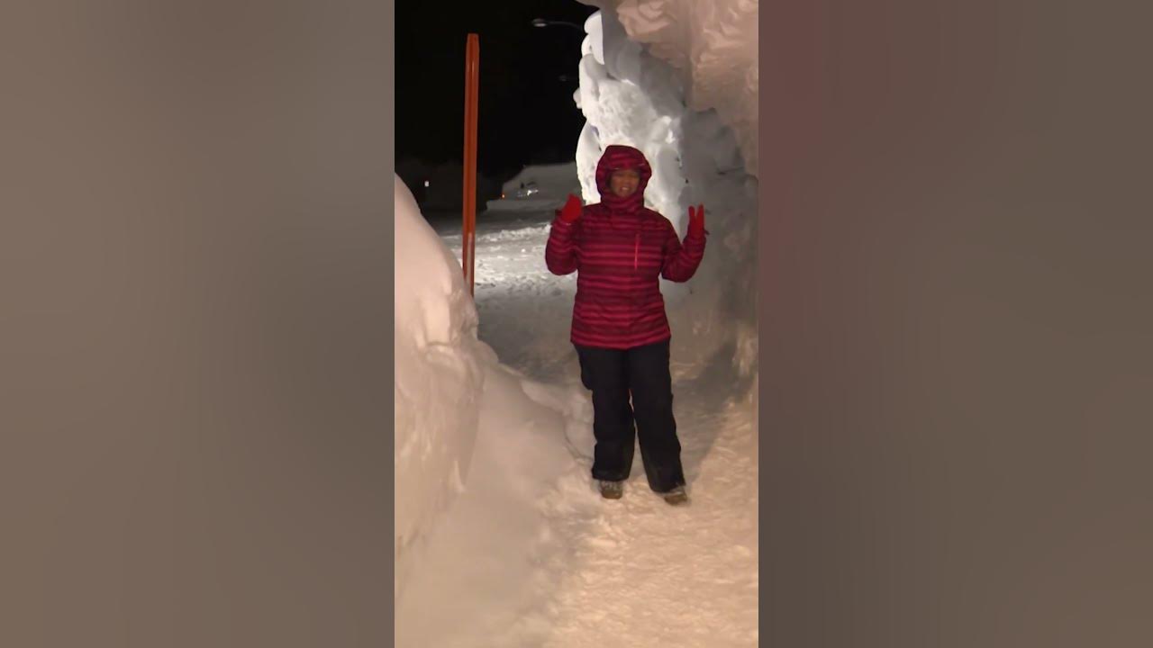 CNN reporter walks through massive snow trench in California