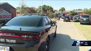 Suspect accused of impersonating officer shot dead by law enforcement near Yukon