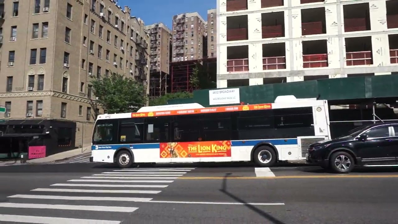 NYC Bus: Inwood bound Orion VII NG HEV 4112 M100 at Fairview Av/Broadway
