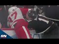 Red Wings JT Compher Fights Devils Stefan Noesen After Laying Big Hit On Nico Hischier mp3