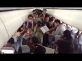 Philadelphia orchestra musicians perform on flight waiting on beijing tarmac