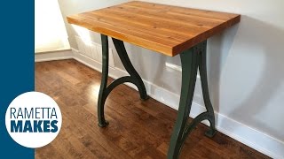 I built a custom console / side table from some cast iron legs from an old screw machine lathe from the Garvin Machine Co. NY, and 