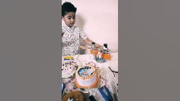 Robo lover cut his cake by self made robot