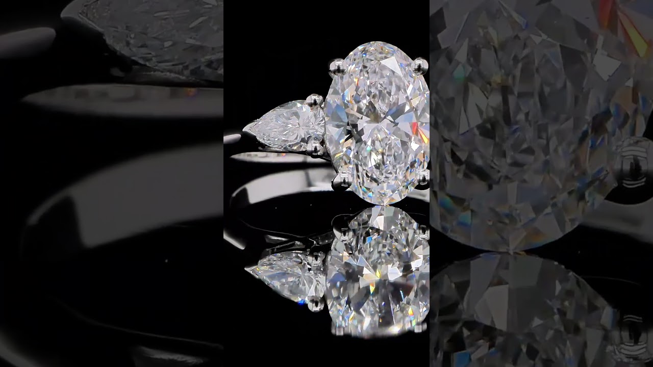 2.00 Carat Oval Lab Grown Three Stone Ring In 18K White Gold Pear Sides - Orogem Jewelers