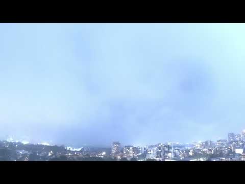 Sheets and Curtains of Glowing Light Over Sydney