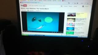 Nick Jr Face Watches a Tennis Match