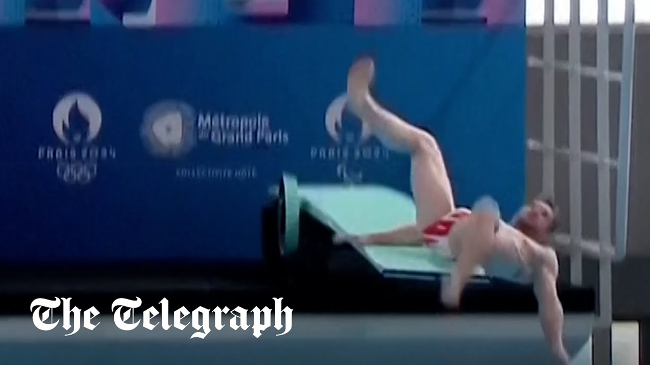 French diver slips and falls during Olympic inauguration ceremony - YouTube