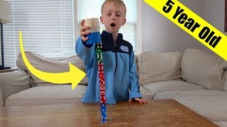 Dice Stacking Trick Shots By A 5 Year Old Thats Amazing