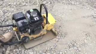 Compacting stone for driveway paving sub base