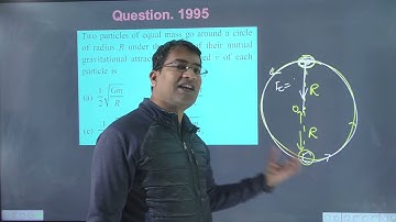 Two particles of equal mass go around a circle of radius R under the action of their mutual