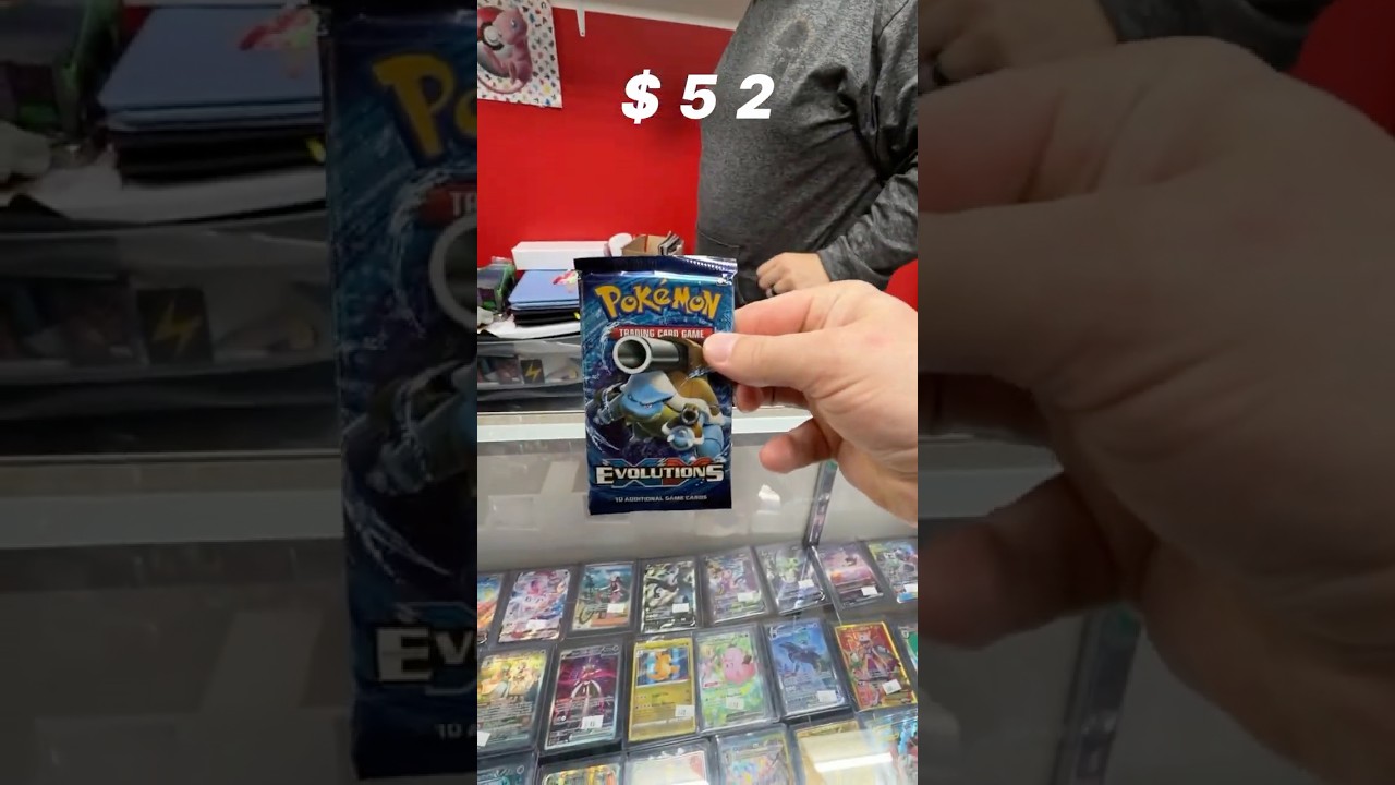 Открываем бустер XY Evolutions, чтобы попытаться выбить Чаризарда (ДЕНЬ 83)