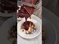 Huge chocolate raclette poured over Basque cheesecake 🍫