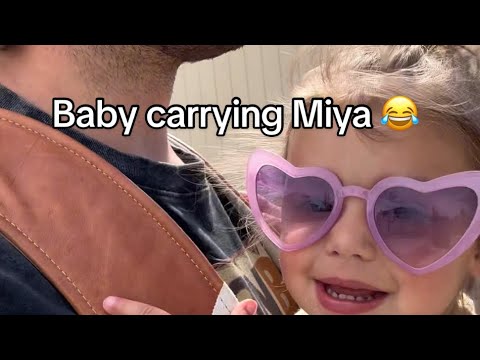 Going on a walk baby carrying a 2 year old 😂😂