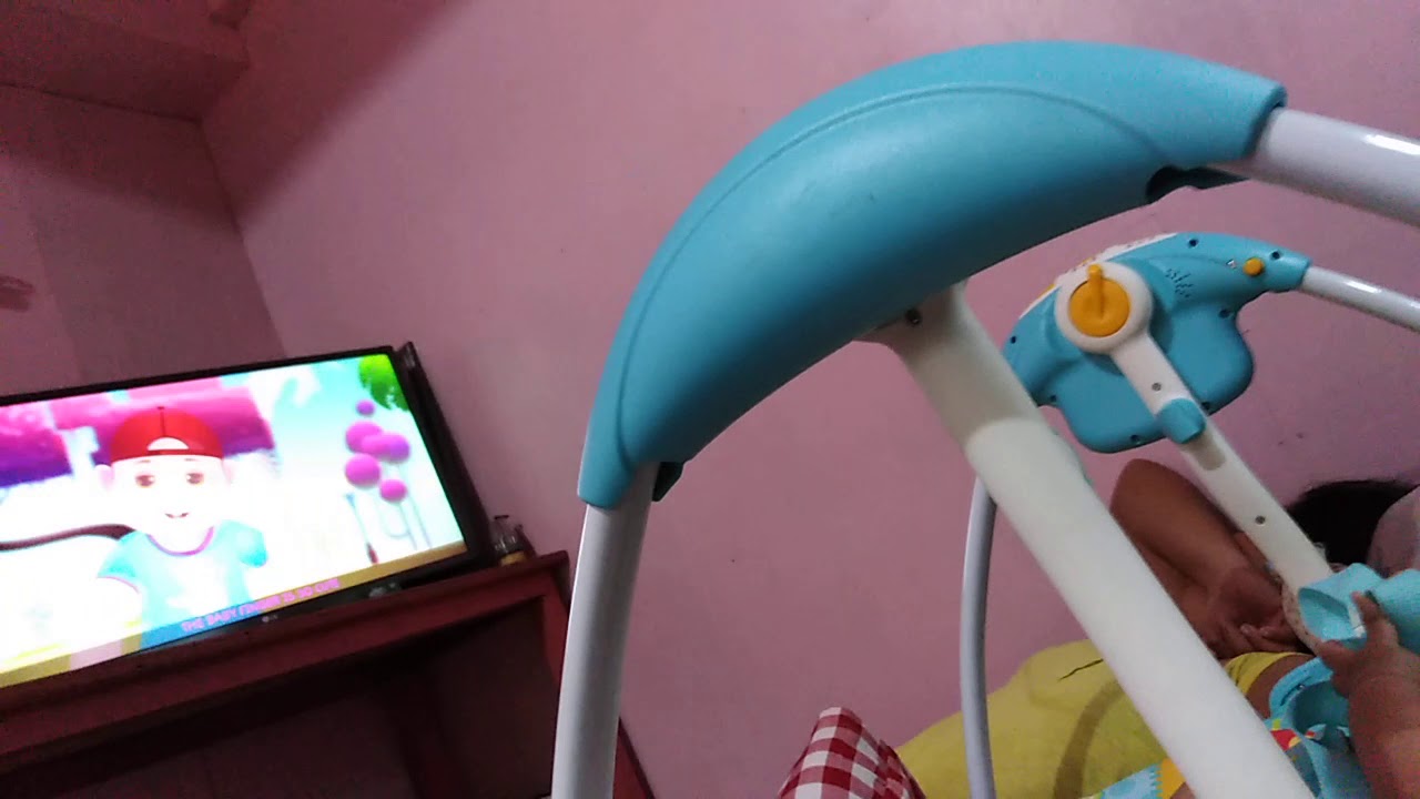 3 months old baby watching tv/nursery rhymes YouTube