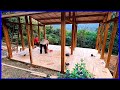 the process of building wooden houses on the mountain