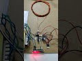Wireless Power Transmission for Electrical Vehicle with charge controller and voltage display