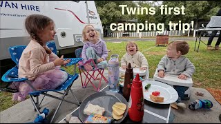 Twins having a laugh at lunch camping for the first time in Warburton.