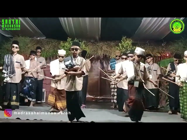 Rampak Stick Santri Madrasah Al-Munawwaroh class=