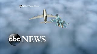 Russian fighter jet flies within feet of a US Air Force reconnaissance plane