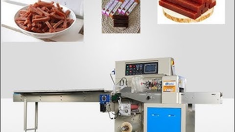 Automatic flow wrapping machine for food packaging
