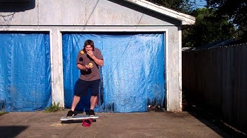 Eating 3 Apples While Juggling Them While On A Rola Bola Balance Board  In One Minute