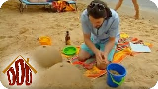 Die peinliche Sandfigur