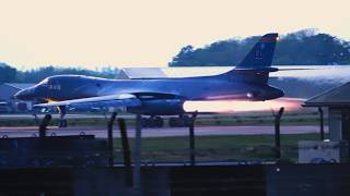 Two B-1Bs training for Epic Fury - afterburners and sunsets.