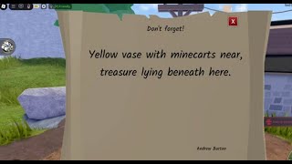 Yellow vase with minecarts near, treasure lying beneath here.