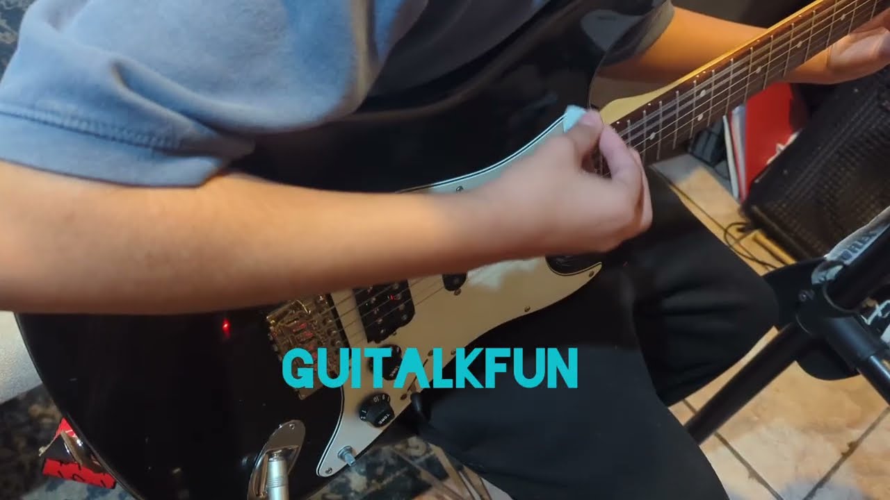 Starcaster Strat by Fender. My son's guitar gets some work done. 