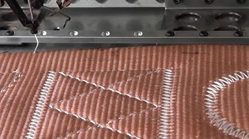 Extra y heavy duty programmable pattern sewer with automatic thread trimmer