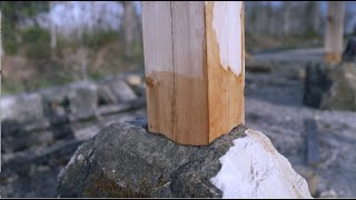 Scribing and plumbing timber frame pavillion posts.