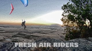 Paraglider vs hang glider! (Fresh Air Riders 2002)