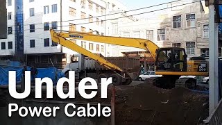 Wow Amazing! Komatsu pc 200 Excavator - Loading Mud in Truck Under Power Cable By Experience Driver