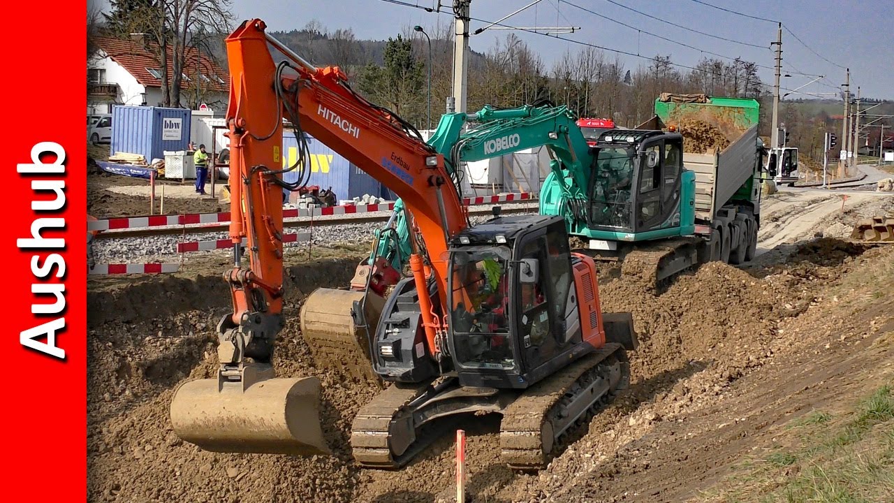 Aushub Rückhaltebecken (Hitachi Zaxis 135US, Kobelco SK140SRLC Bagger und MAN Truck)
