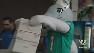 Volunteers Assemble Hundreds Of Holiday Care Packages For Troops Overseas