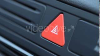 Woman Pressing Red Triangle Car Hazard Warning Button - Stock Footage | VideoHive 15400847