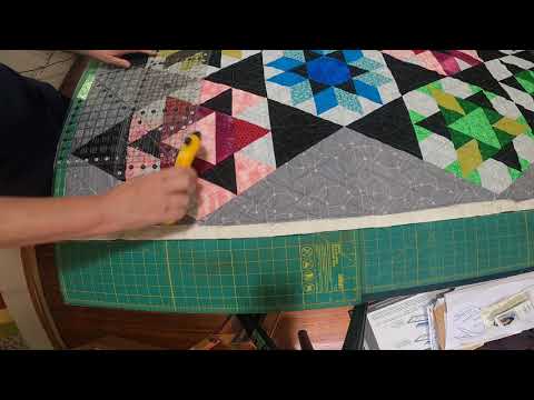 Squaring up a not so square quilt - YouTube