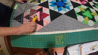 Squaring up a not so square quilt