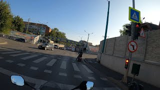 Moped running red light, traffic